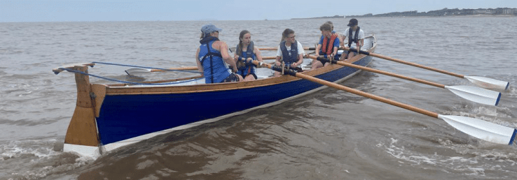 Bristol Gig Club Junior squad competing in a regatta
